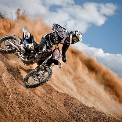 Freestyle Motocross Rider Going Down Hill. Professional Action Photographer Ben Bergh ZA
