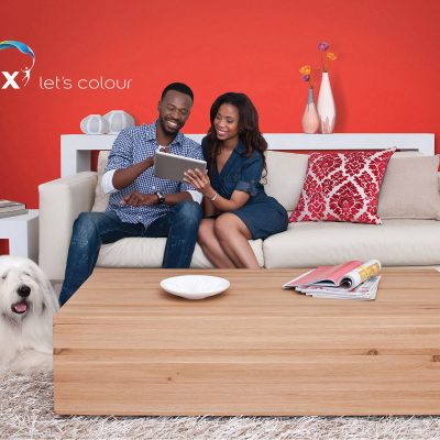 Couple in livingroom Dulux advertising shoot