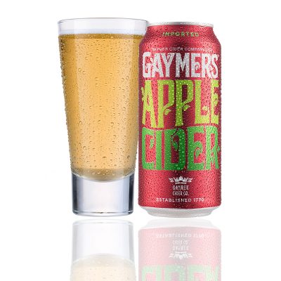 Gaymers Apple Cider alongside glass filled with the cider