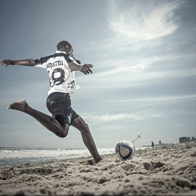 Football Beach Action Shot. Detailed Action Photography by Professional SA Photographer Ben Bergh ZA for Investec