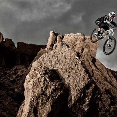 Mountain Bike Ramp off Cliff. Action Advertising Photography by Ben Bergh ZA